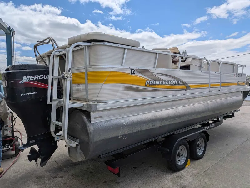 Slide: The Image of 2005 Princecraft Pontoon boat with Mercury outboard motor. - 10