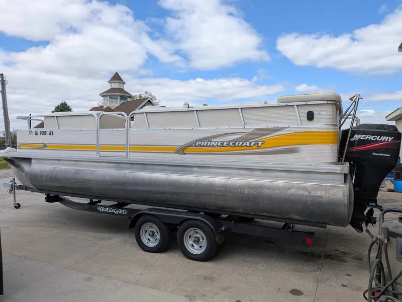 Slide: The Image of 2005 Princecraft Pontoon boat on trailer, with Mercury outboard motor. - 3