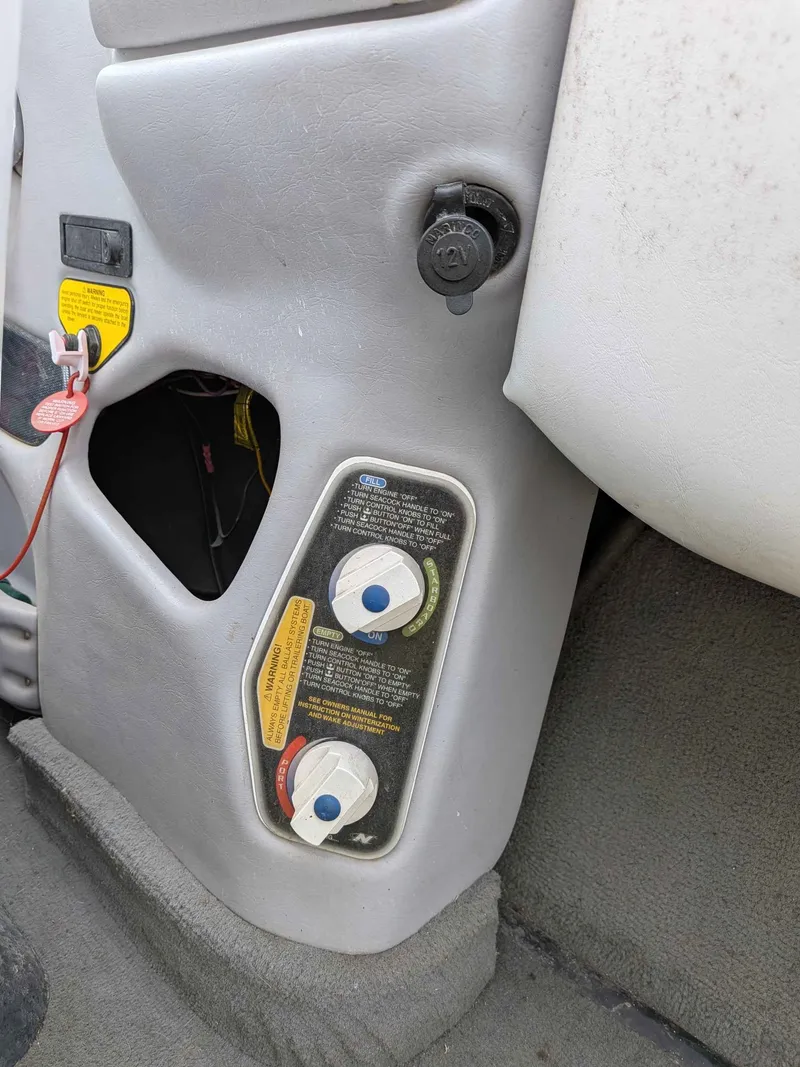 Slide: The Image of Control panel of a 2000 Correct Craft Air Nautique boat. - 10