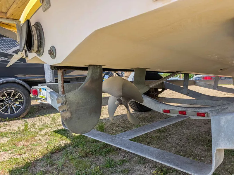 Slide: The Image of Underside of a 2000 Correct Craft Air Nautique boat on a trailer. - 13