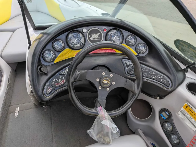 Slide: The Image of Dashboard of a 2000 Correct Craft Air Nautique boat. - 8