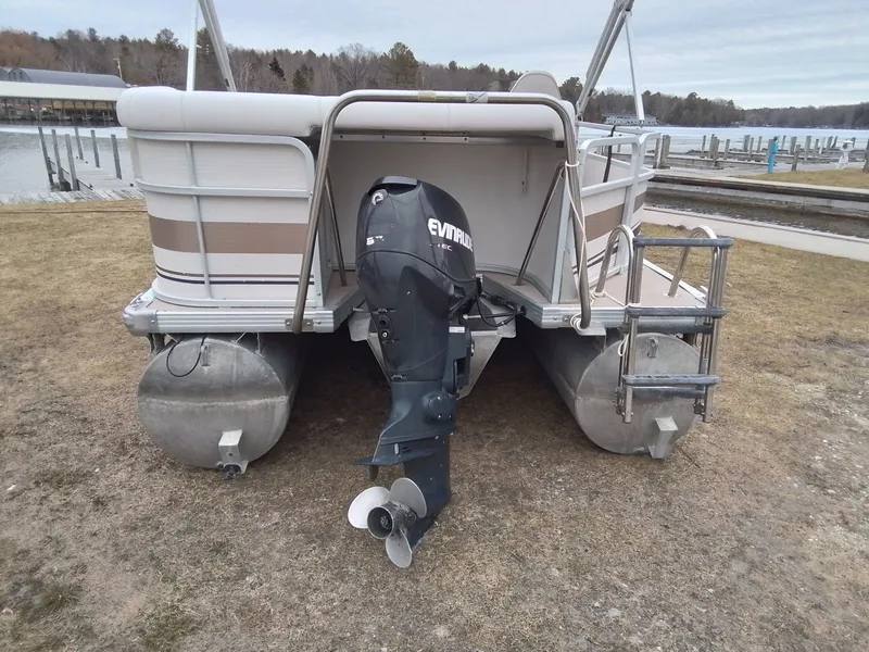 Slide: The Image of 2006 Premier 225 Sunsation pontoon boat with outboard motor. - 5