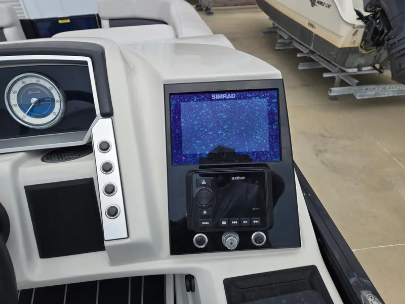 Slide: The Image of Dashboard of 2021 Barletta 23U CORSA with Simrad display. - 11
