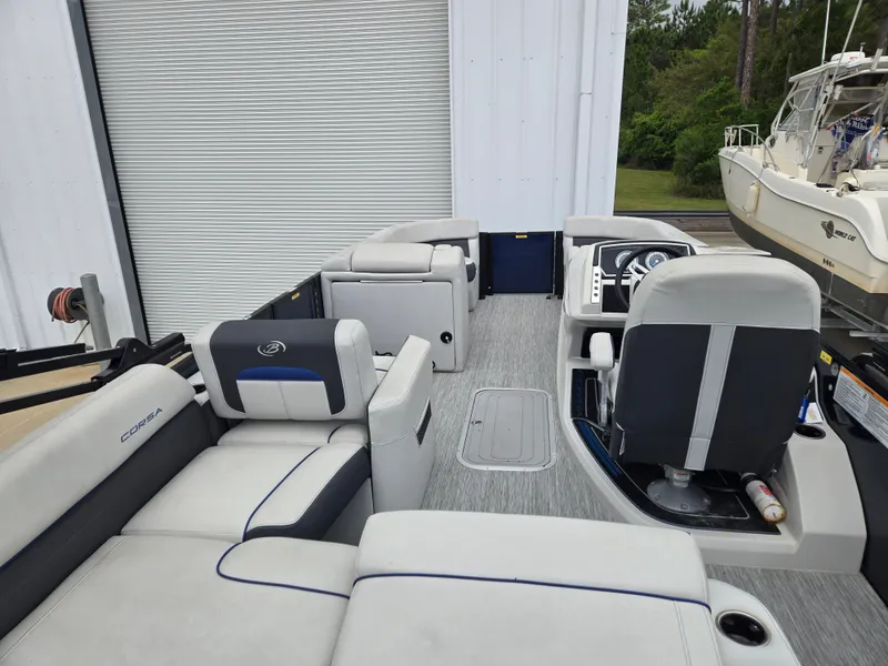 Slide: The Image of Interior of a 2021 Barletta 23U CORSA pontoon boat with luxurious seating. - 5