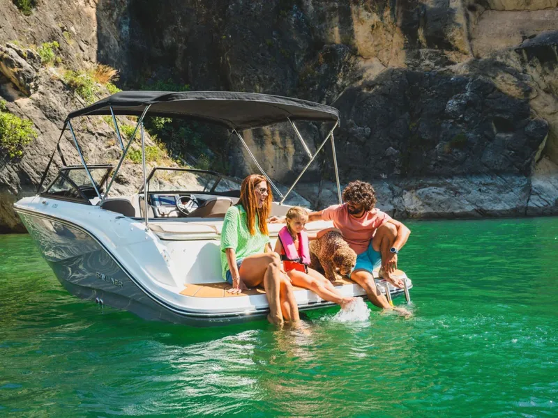 Slide: The Image of Family enjoying boat trip on Bayliner V20i, 2026 model. - 8