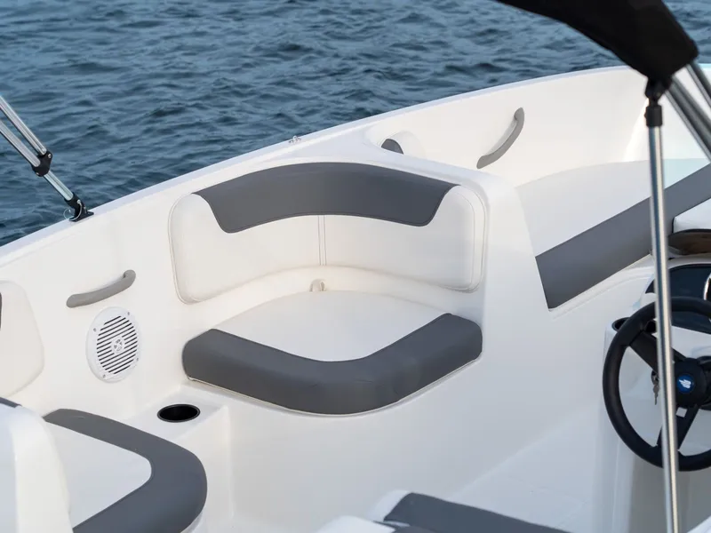 Slide: The Image of Interior of Bayliner Element E16 boat, 2026 model, on calm water. - 3