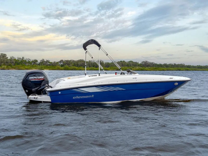 Slide: The Image of 2026 Bayliner Element E16 boat on calm water. - 6