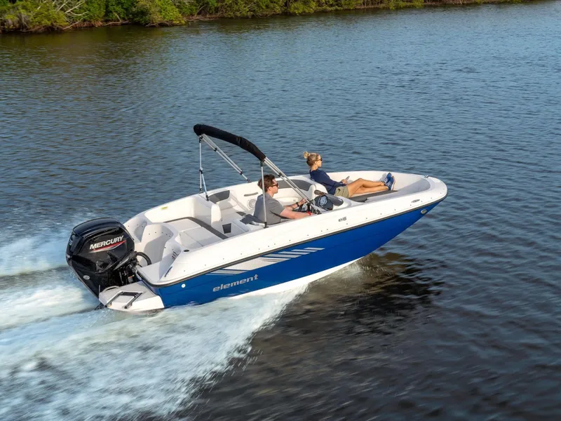 Slide: The Image of Bayliner Element E16 2026 cruising on calm water. - 9
