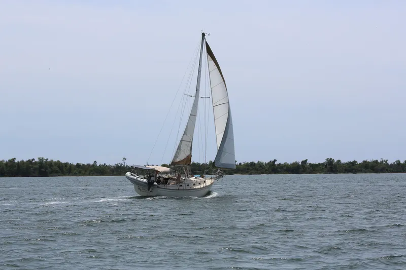 Slide: The Image of Sailing yacht Island Packet 35, 1994 model, cruising on open water. - 21