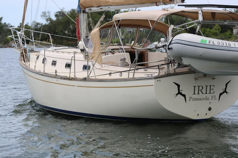 Slide: The Image of 1994 Island Packet 35 sailboat named "IRIE" on water, Pensacola, FL. - 9