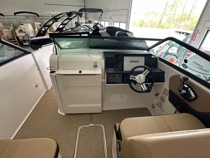 Slide: The Image of Interior view of 2024 Sea Ray SDX 250 boat cockpit. - 13