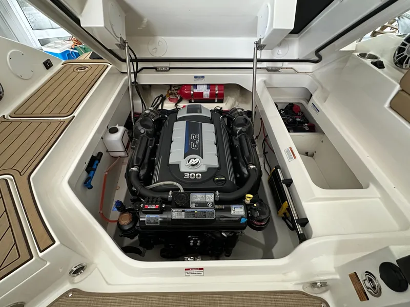 Slide: The Image of Engine compartment of 2024 Sea Ray SDX 250 boat. - 14
