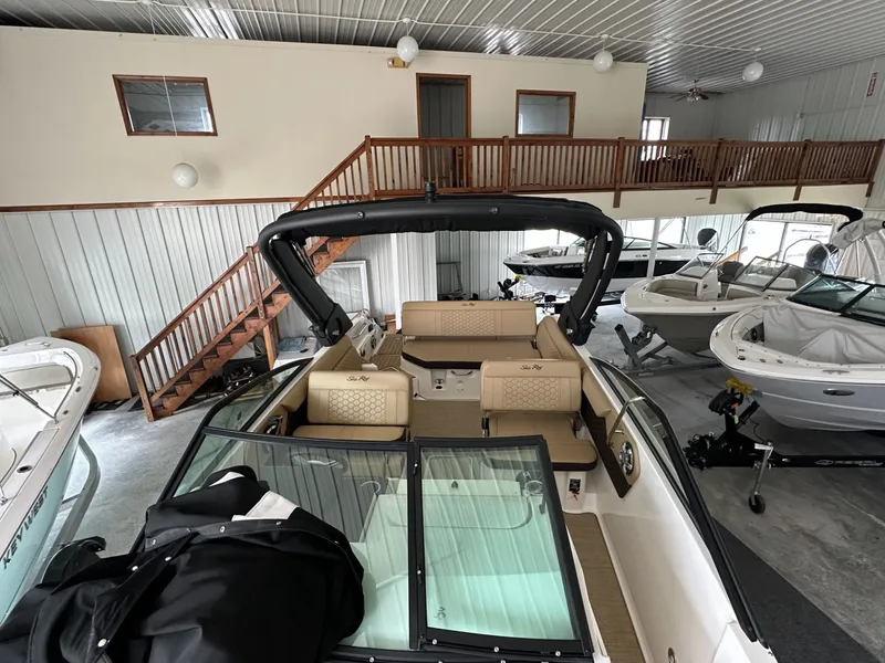 Slide: The Image of 2024 Sea Ray SDX 250 boat in showroom. - 17
