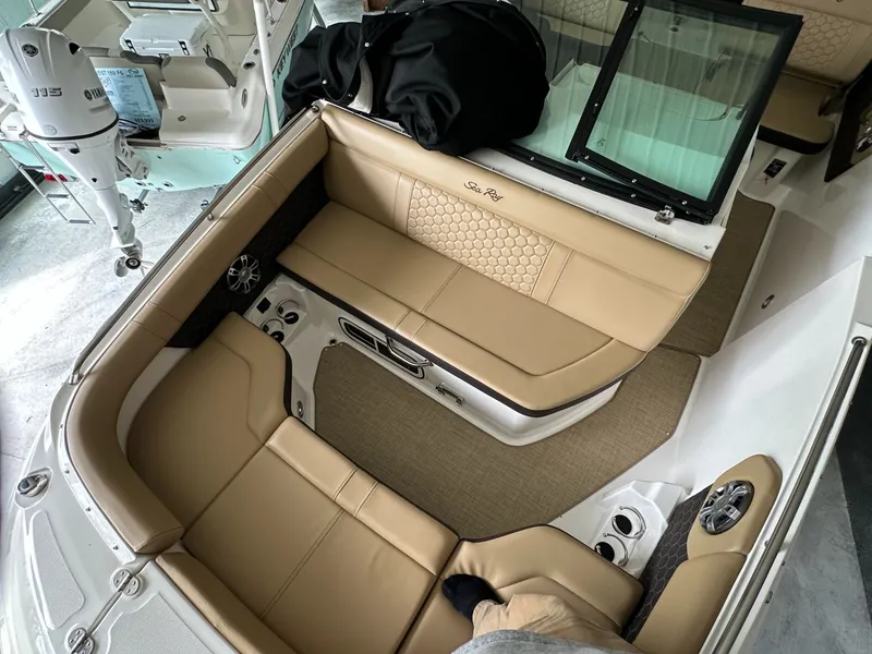 Slide: The Image of Interior of 2024 Sea Ray SDX 250 boat with beige seating. - 18