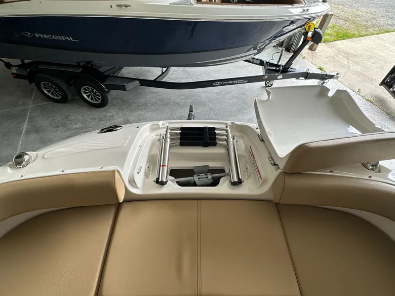Slide: The Image of Rear view of 2024 Sea Ray SDX 250 with Regal boat in background. - 20