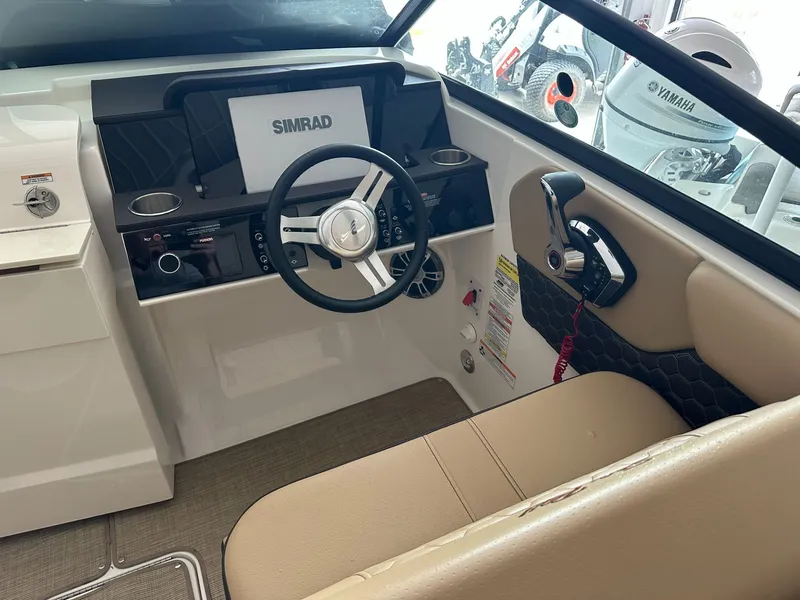 Slide: The Image of Interior view of 2024 Sea Ray SDX 250 cockpit. - 22