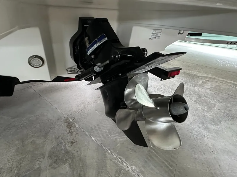Slide: The Image of 2024 Sea Ray SDX 250 boat drive and propeller close-up. - 7