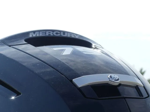 Slide: The Image of Close-up of a Mercury 75 outboard motor on a 2026 Mako Pro Skiff 17 CC. - 11
