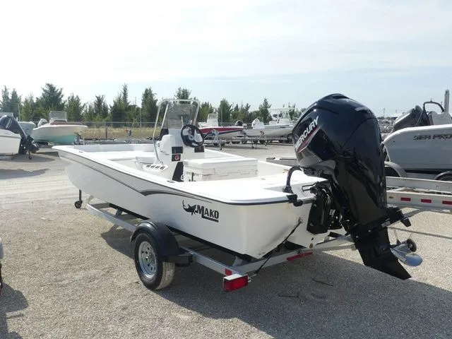 Slide: The Image of 2026 Mako Pro Skiff 17 CC boat with Mercury outboard motor. - 6