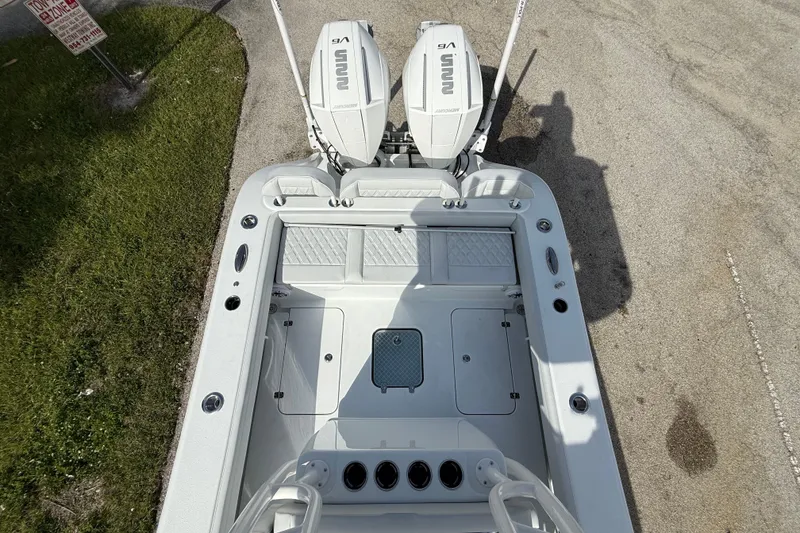 Slide: The Image of Top view of 2026 Yellowfin 26 Hybrid boat with dual outboard engines. - 9