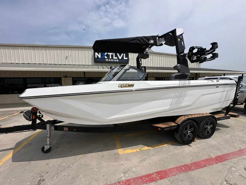 The Image of 2026 Nautique Super Air Nautique GS22 boat on trailer at NXT LVL Marine. - 1