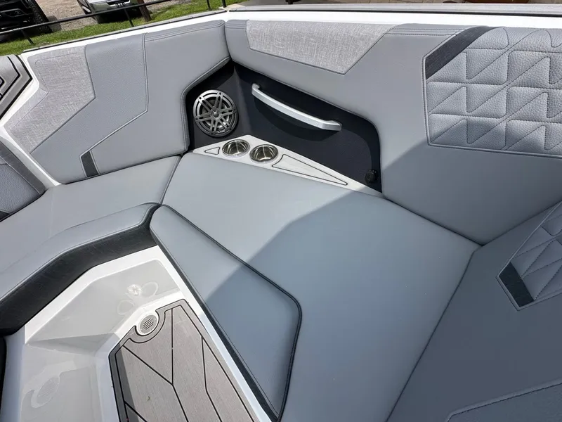 Slide: The Image of Interior of 2026 Nautique Super Air Nautique GS22 with gray upholstery. - 20