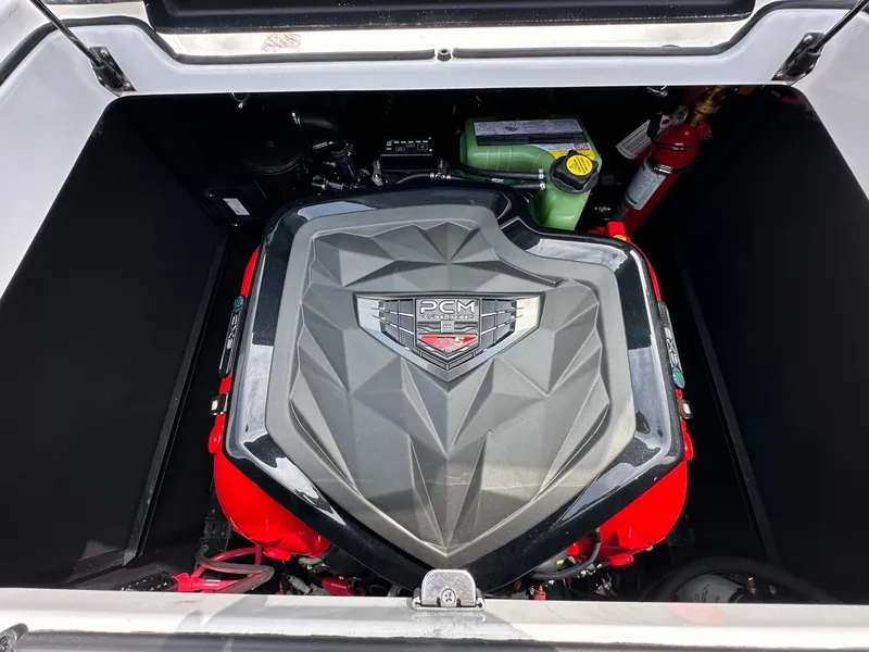 Slide: The Image of Engine compartment of the 2026 Nautique Super Air Nautique GS22 boat. - 32