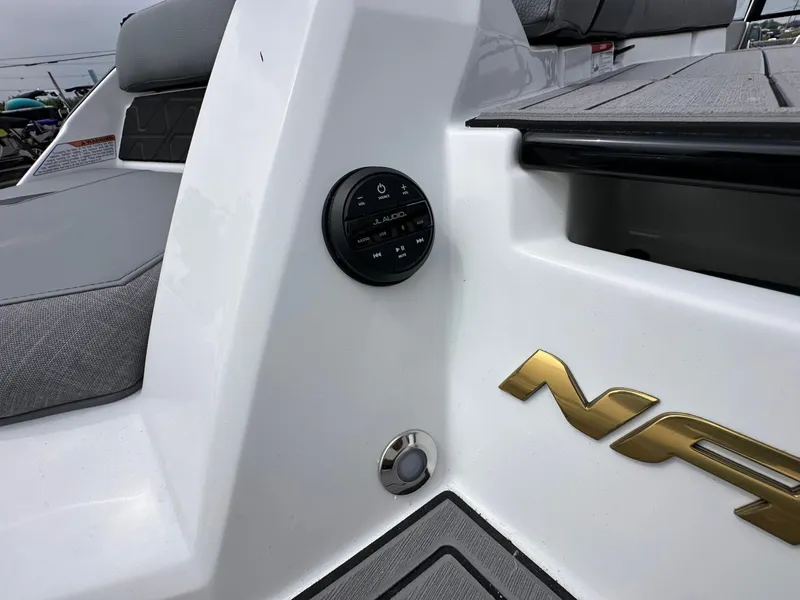 Slide: The Image of 2026 Nautique Super Air Nautique GS22 boat with JL Audio system. - 34