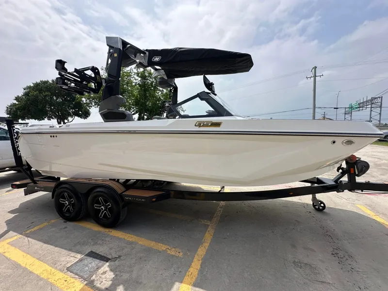 Slide: The Image of 2026 Nautique Super Air Nautique GS22 on trailer, side view. - 8