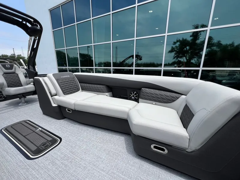 Slide: The Image of Luxurious seating on Harris Sunliner 250 pontoon boat, model 2026. - 12