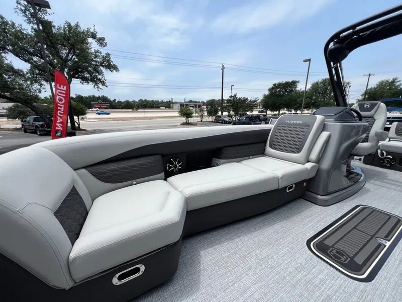 Slide: The Image of Luxurious interior of the 2026 Harris Sunliner 250 pontoon boat. - 13