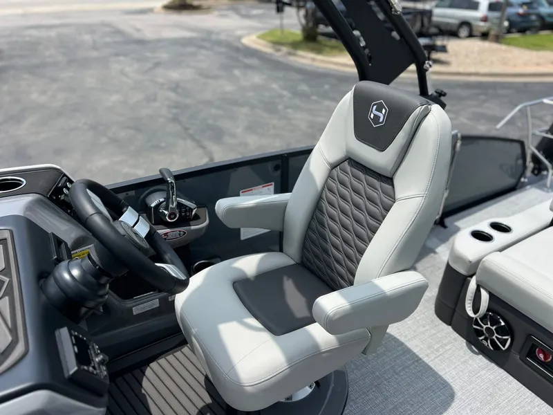 Slide: The Image of Luxurious seating in Harris Sunliner 250 pontoon boat, model 2026. - 18