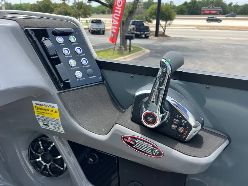 Slide: The Image of 2026 Harris Sunliner 250 control console with controls. - 22