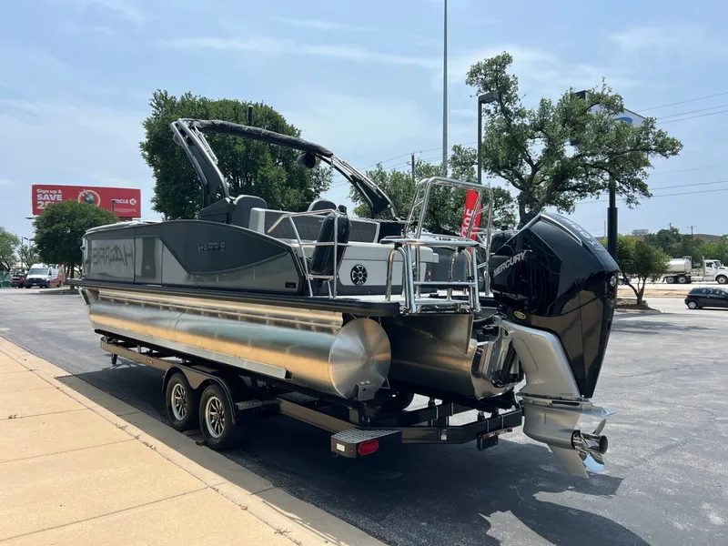 Slide: The Image of 2026 Harris Sunliner 250 pontoon boat on trailer, Mercury engine. - 7