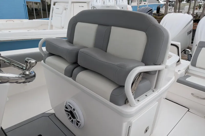 Slide: The Image of 2023 Everglades 273 Center Console boat with gray and white cushioned seating. - 3