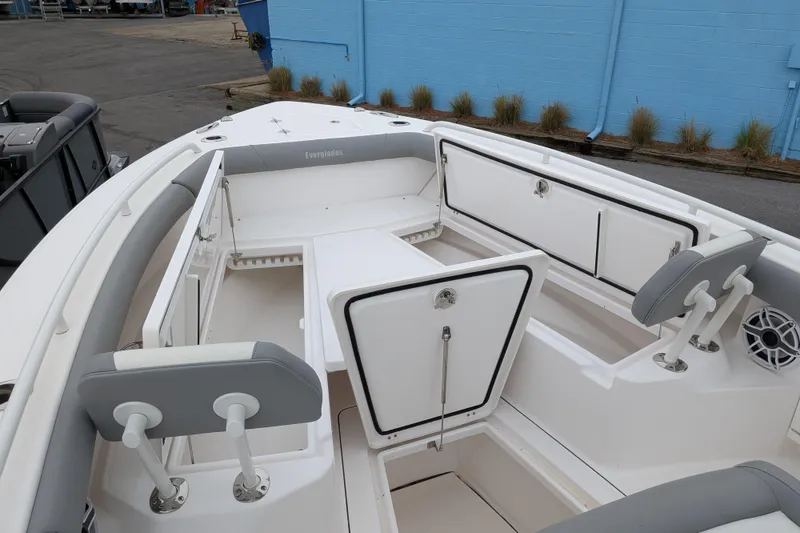 Slide: The Image of 2023 Everglades 273 Center Console boat interior with seating and storage compartments. - 5