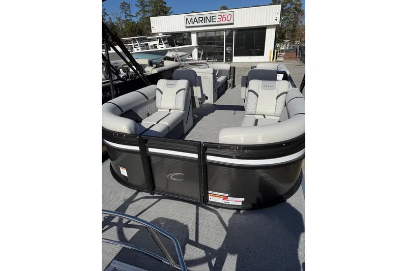 Slide: The Image of 2025 Crest CLASSIC 220 SLC pontoon boat with luxurious seating at Marine 360 dealership. - 5