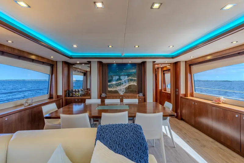Slide: The Image of Luxurious interior of 2004 Sunseeker 105 Yacht with elegant dining area and ocean views. - 49