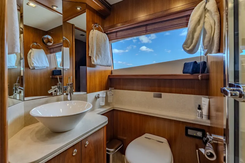 Slide: The Image of Luxurious bathroom on a 2004 Sunseeker 105 Yacht with modern fixtures and ocean view. - 62