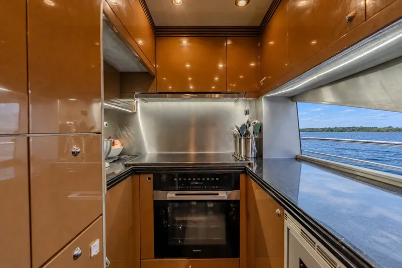 Slide: The Image of Luxurious kitchen interior of 2004 Sunseeker 105 Yacht with ocean view. - 56