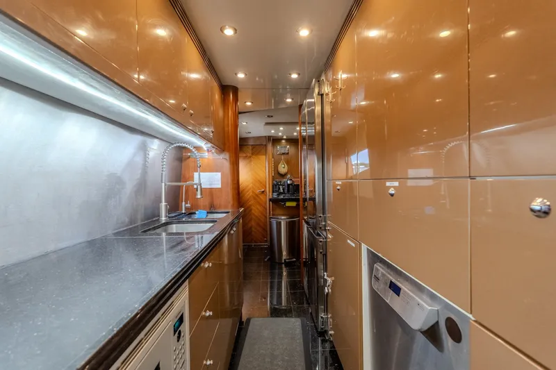 Slide: The Image of Luxurious kitchen interior of 2004 Sunseeker 105 Yacht with modern appliances and sleek design. - 57