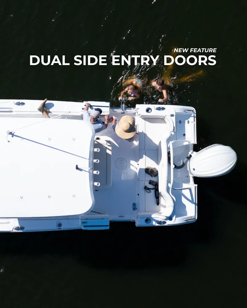 Slide: The Image of 2026 Sea Hunt Ultra 255 SE boat with dual side entry doors, aerial view. - 14