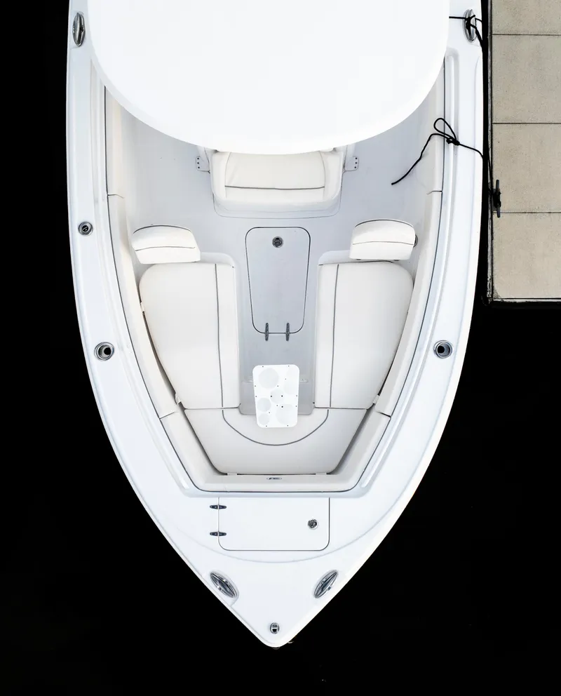 Slide: The Image of 2026 Sea Hunt Ultra 255 SE boat, top view, showcasing sleek design and spacious seating. - 22