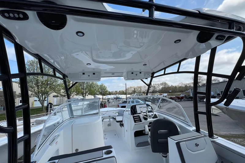 Slide: The Image of 2026 Sea Pro 240 Dual Console boat interior with modern helm and seating. - 15