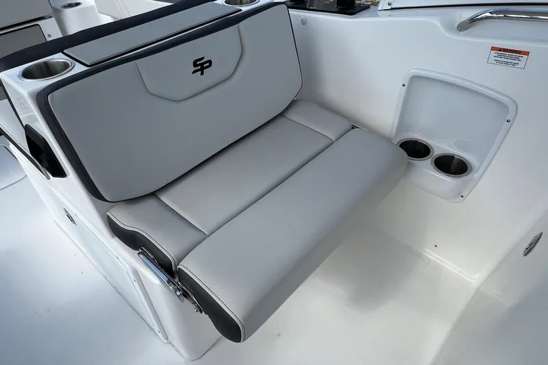 Slide: The Image of 2026 Sea Pro 240 Dual Console boat seat with cup holders and sleek design. - 17
