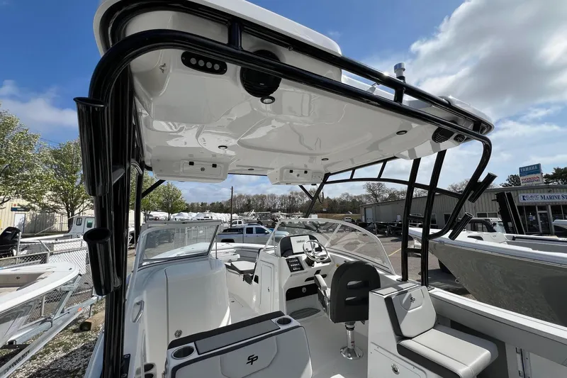 Slide: The Image of 2026 Sea Pro 240 Dual Console boat interior with modern helm and seating. - 28