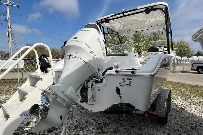 Slide: The Image of 2026 Sea Pro 240 Dual Console boat with Suzuki outboard motor on trailer. - 5