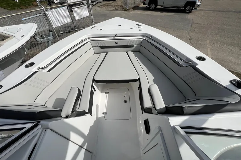 Slide: The Image of 2026 Sea Pro 240 Dual Console boat interior with spacious seating and sleek design. - 9