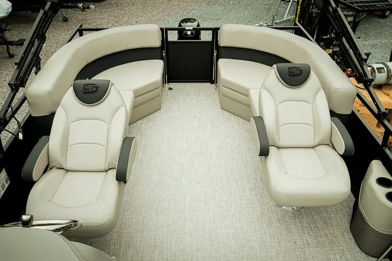 Slide: The Image of Luxurious seating on 2026 Dockside 20DQ boat, featuring plush beige upholstery and modern design. - 12