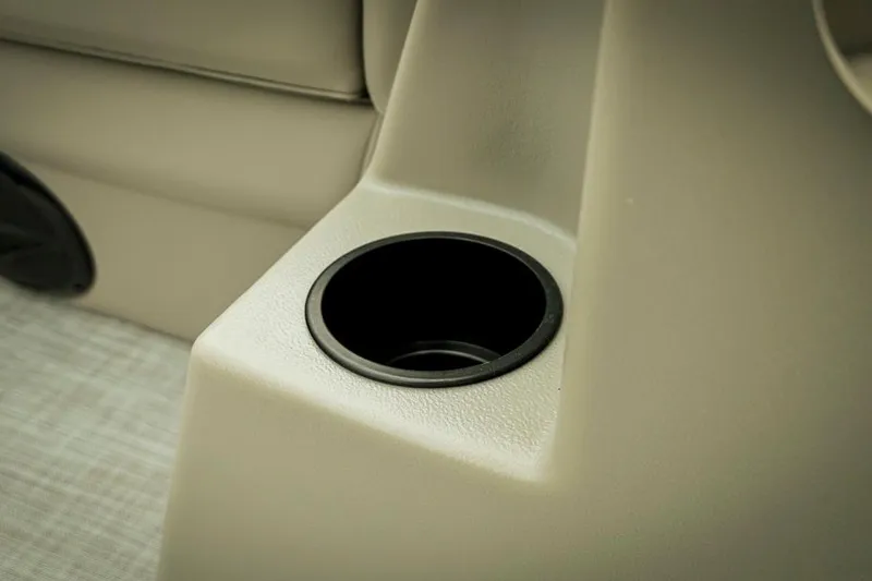 Slide: The Image of Cup holder in 2026 Dockside 20DQ boat, beige interior detail. - 13